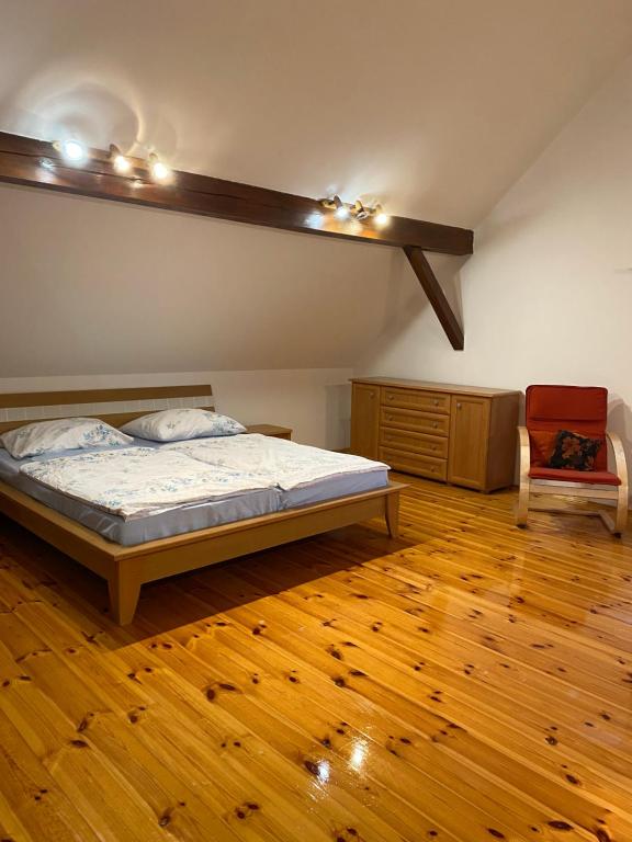 Postel nebo postele na pokoji v ubytování Chalupa Na Louce Salmov