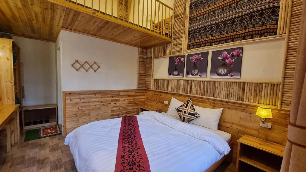מיטה או מיטות בחדר ב-Dang Khoa Homestay