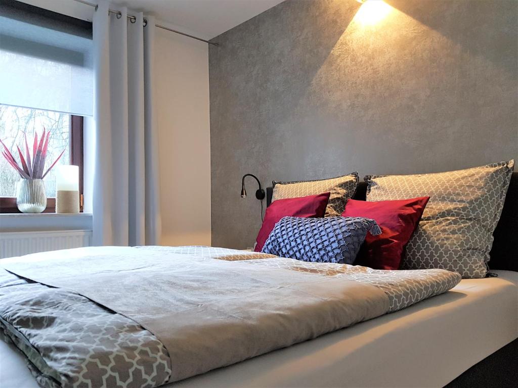 Postel nebo postele na pokoji v ubytování Ferienwohnung Königsquellenpark