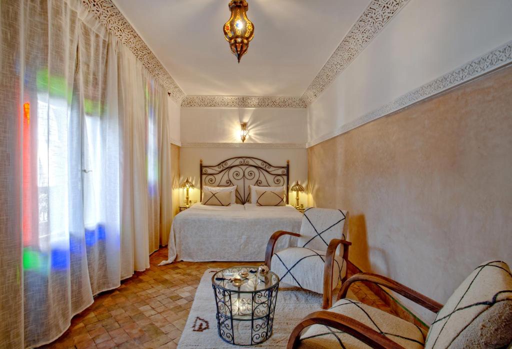 Postel nebo postele na pokoji v ubytování Riad Basim