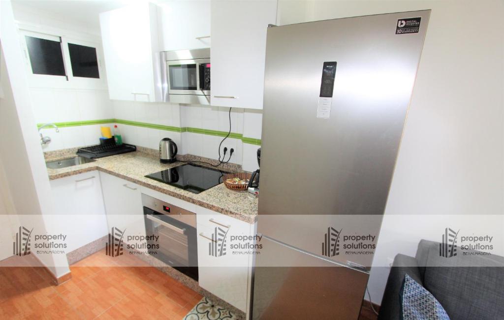 Kuchyňa alebo kuchynka v ubytovaní 102 Estudio en Jupiter Apartmentos - Piscina y Playa - Excelente Ubicación