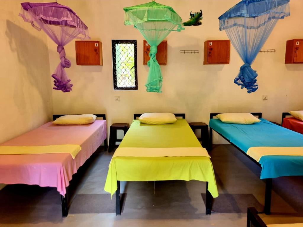 Postel nebo postele na pokoji v ubytování Helena Hostel