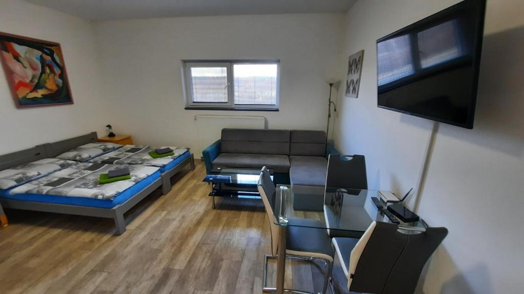 Postel nebo postele na pokoji v ubytování Penzion u vody