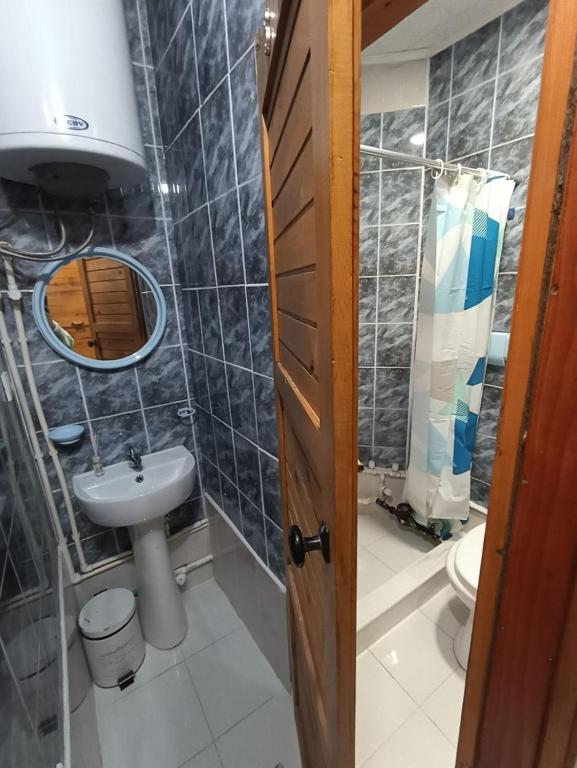 Un baño de Apartments & Rooms Vitko