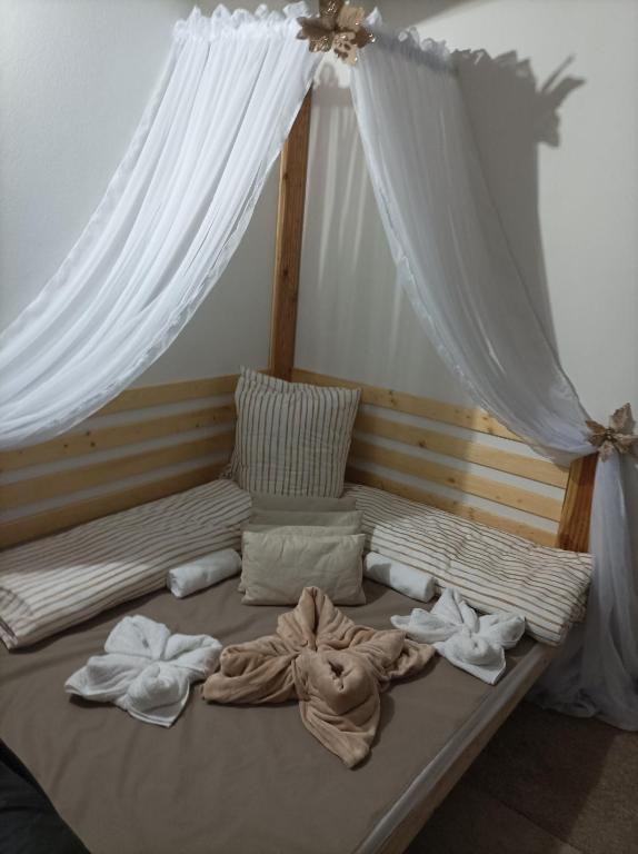 A bed or beds in a room at Private Relax Armonia Wellness Apartment