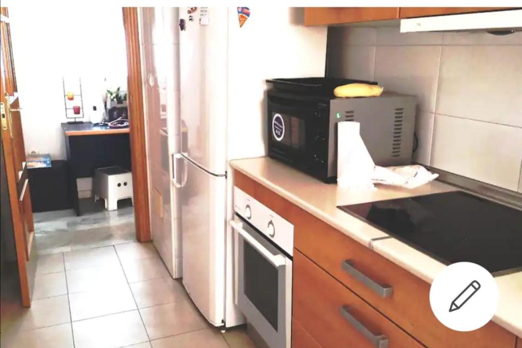 Kuchyňa alebo kuchynka v ubytovaní Habitación con encanto