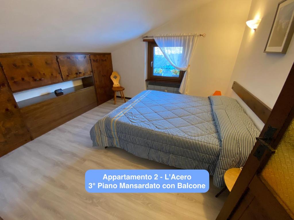 A bed or beds in a room at Il Tiglio Gressan