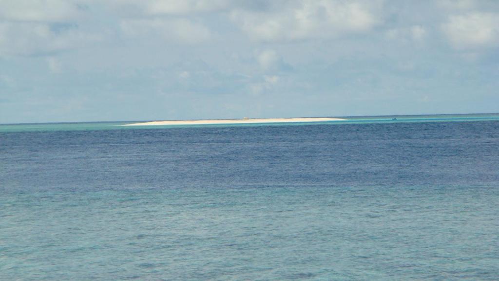 an island in the middle of a large body of water at PRIV Fodhdhoo in Fodhdhoo