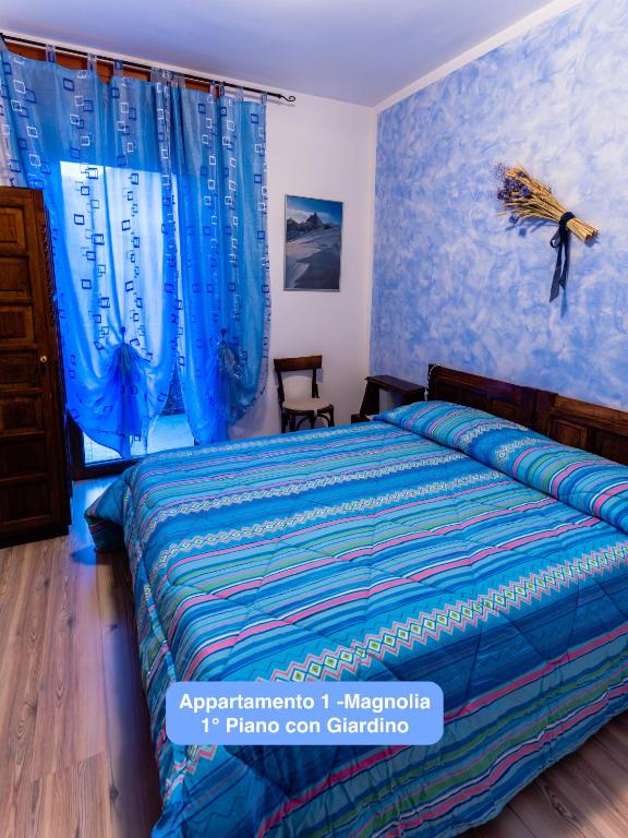 A bed or beds in a room at Il Tiglio Gressan