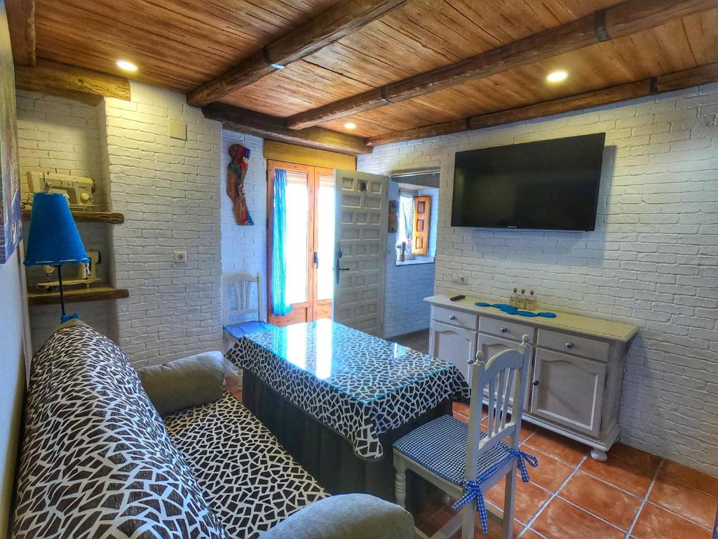 Telewizja i/lub zestaw kina domowego w obiekcie Casa Quinito
