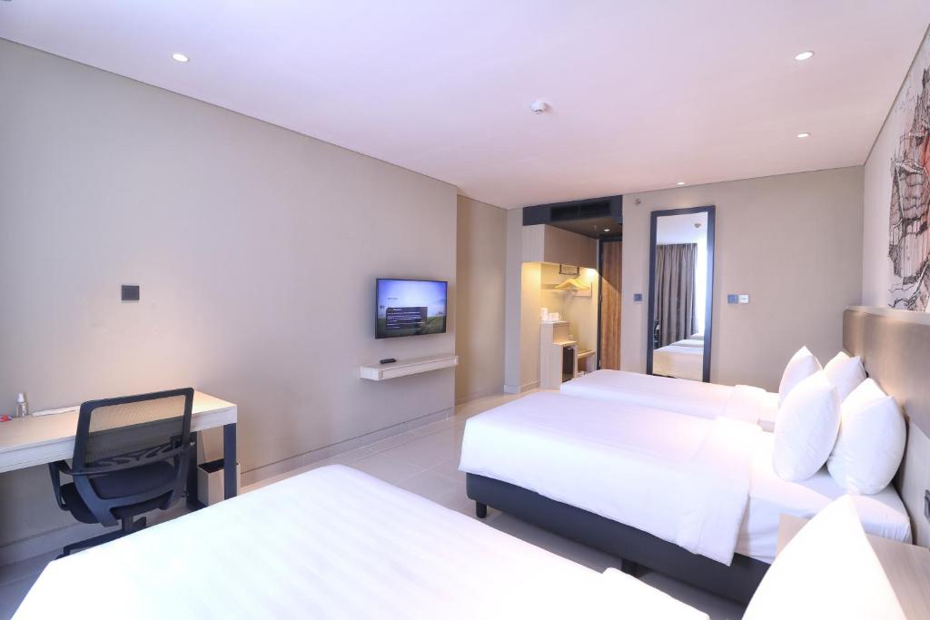 Prime Park Hotel & Convention Lombok - Deluxe Triple Room