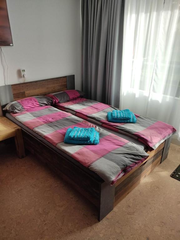 Postel nebo postele na pokoji v ubytování Ferienapartment "Alois" in Sankt Englmar