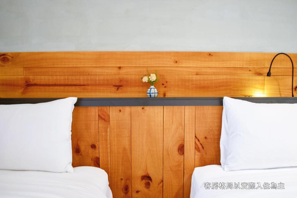 Postel nebo postele na pokoji v ubytování Central Land Hotel