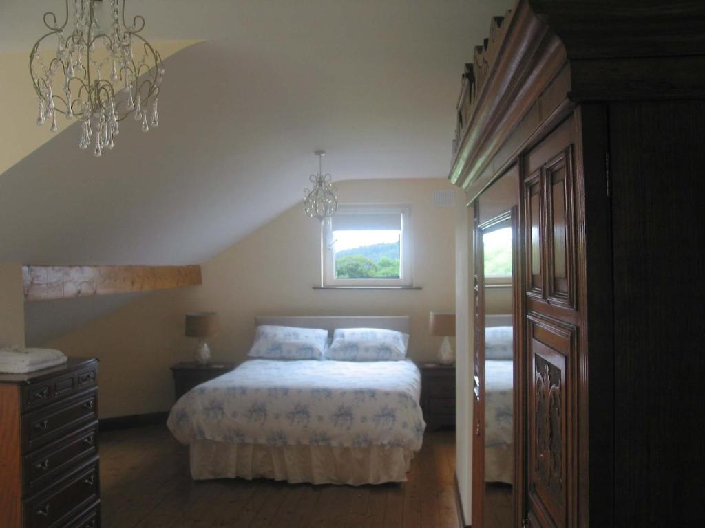 Postel nebo postele na pokoji v ubytování White Hill Country House B&B