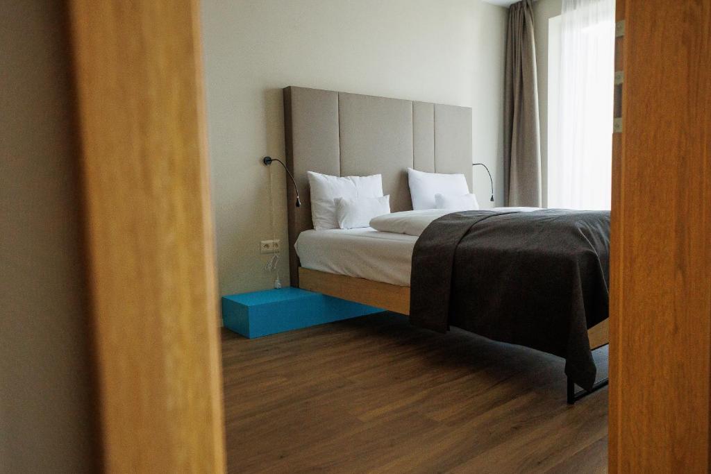 Postel nebo postele na pokoji v ubytování Avenue Pallova 28