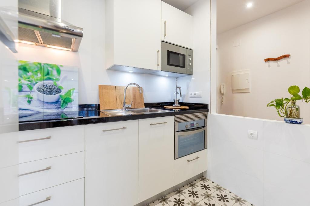 A kitchen or kitchenette at El Carmen Flat