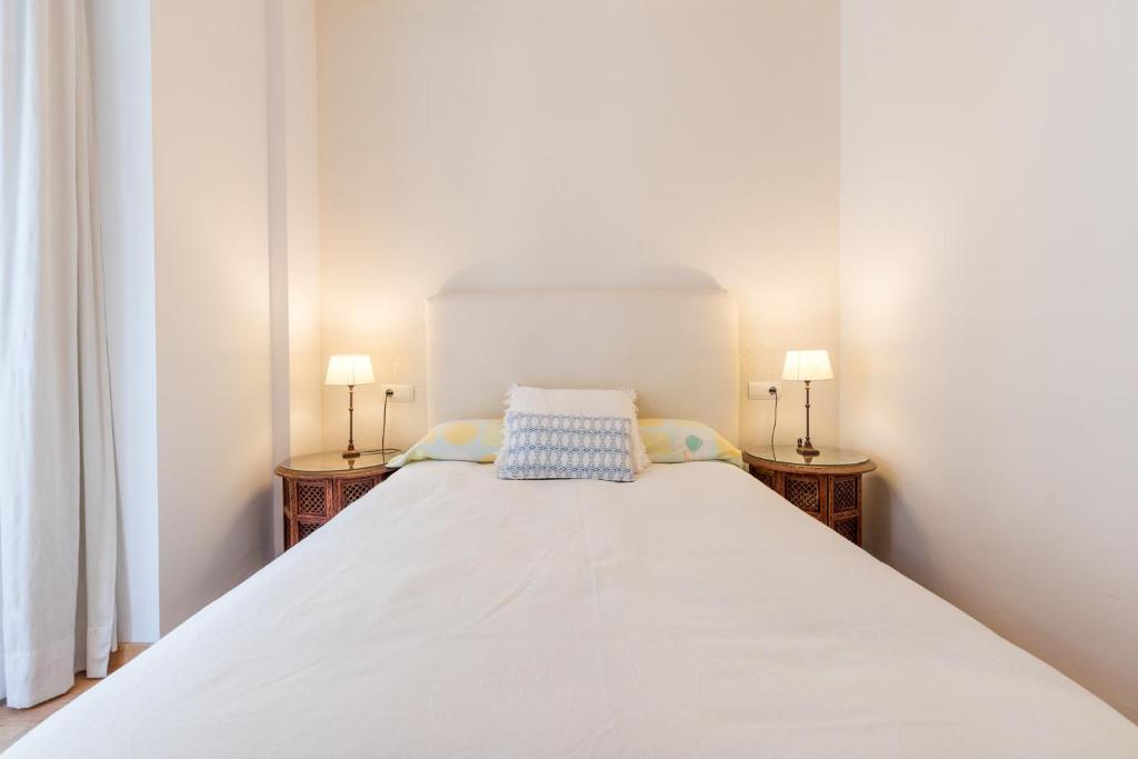 A bed or beds in a room at El Carmen Flat