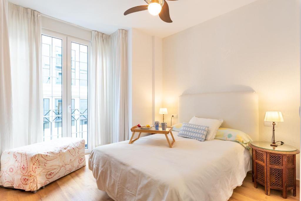 A bed or beds in a room at El Carmen Flat