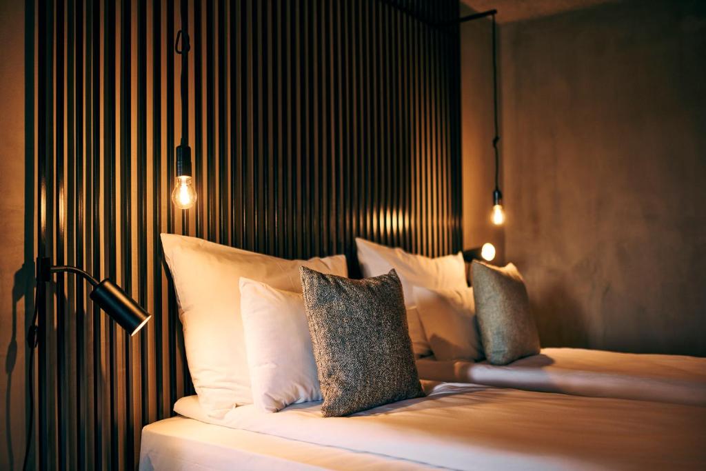 Postel nebo postele na pokoji v ubytování Hotel Maestoso - Lipica
