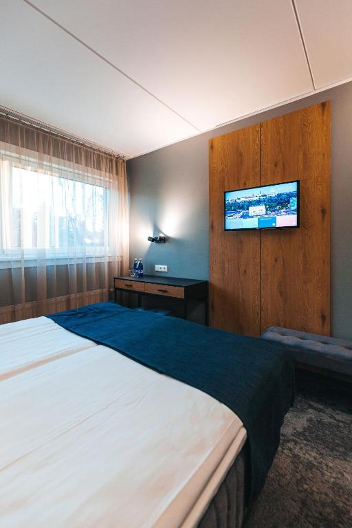Voodi või voodid majutusasutuse Go Hotel Shnelli toas