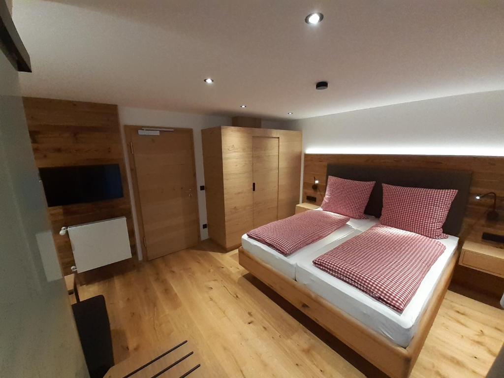 Postel nebo postele na pokoji v ubytování Landgasthof Lusenblick