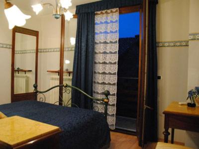Postel nebo postele na pokoji v ubytování Al Benandant