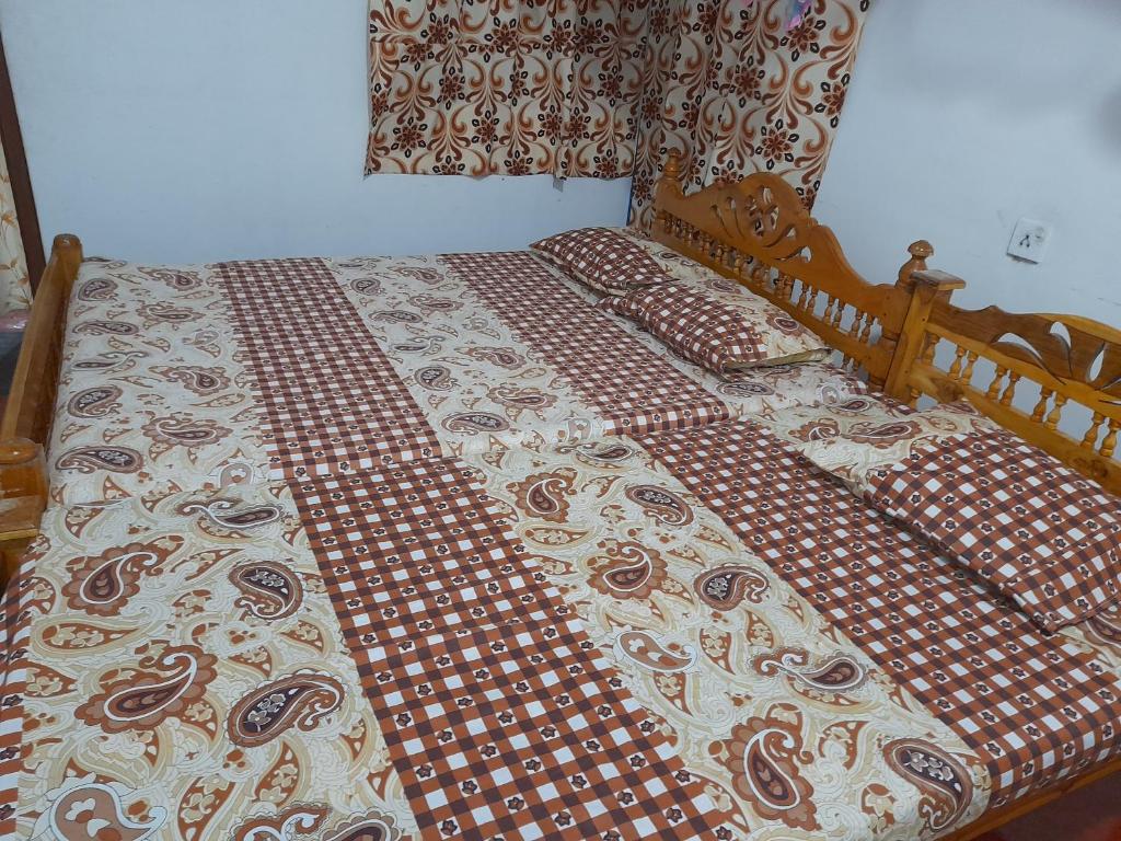 Postel nebo postele na pokoji v ubytování DERO BEACH HOLIDAY HOME