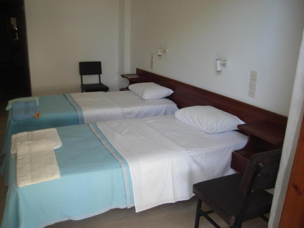 Postel nebo postele na pokoji v ubytování Dimitris Rooms