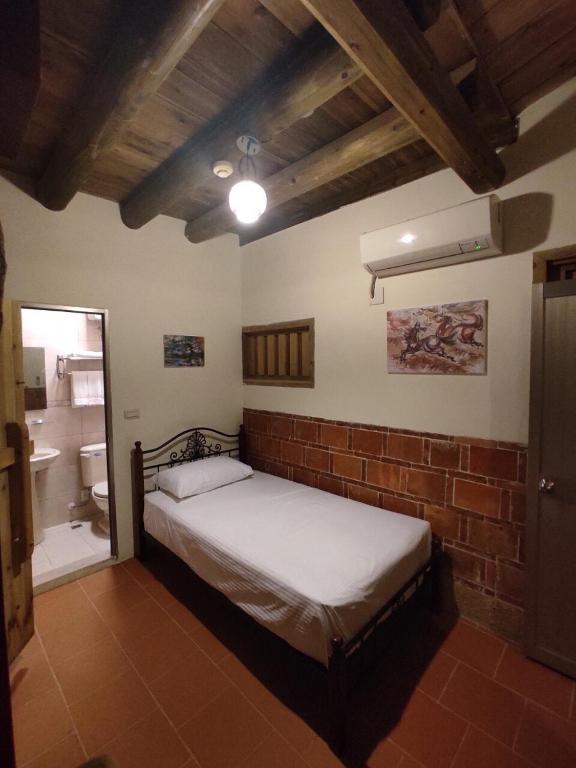 Letto o letti in una camera di Kinmen Courtyard