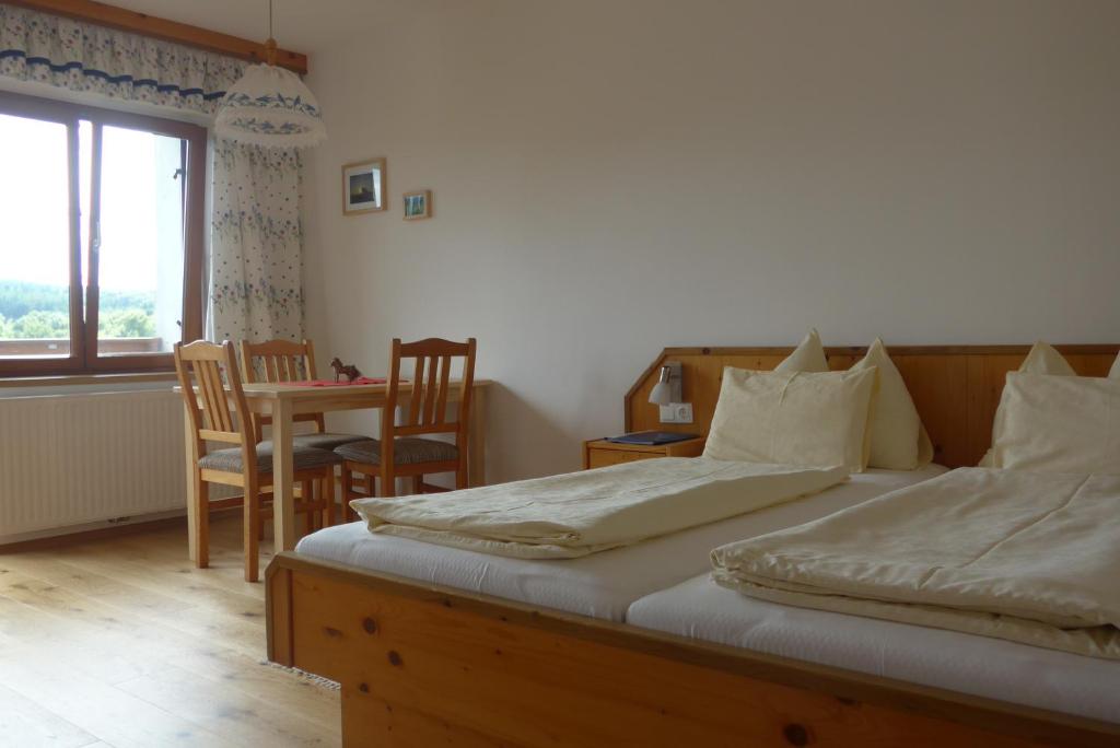 Postel nebo postele na pokoji v ubytování Biobauernhof Wolf-Hof