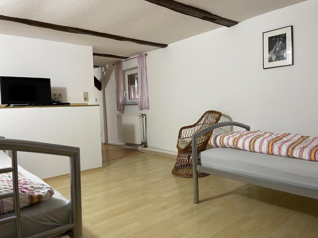 TV a/nebo společenská místnost v ubytování Ferienwohnung Weidner