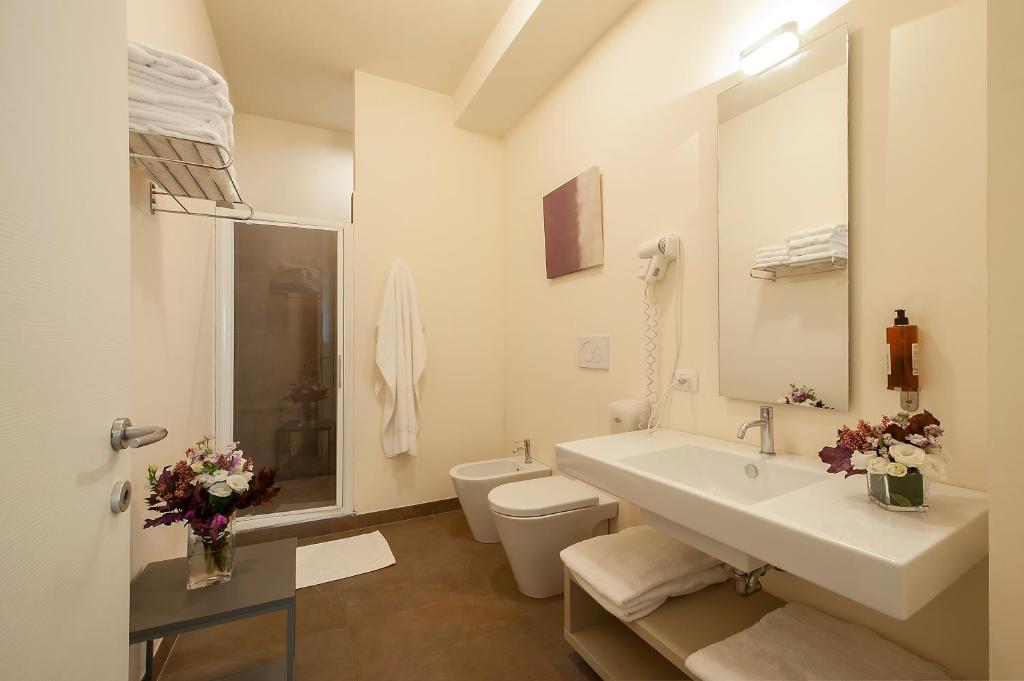 Koupelna v ubytování Hotel La Corte