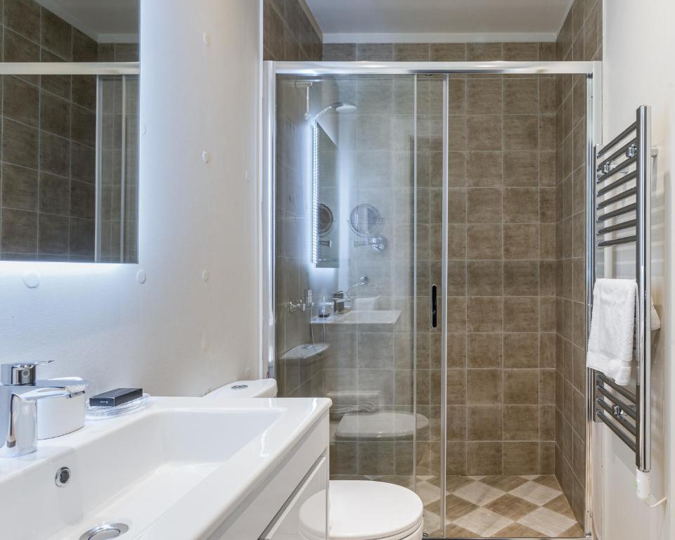 Kúpeľňa v ubytovaní 33SolonosSuites
