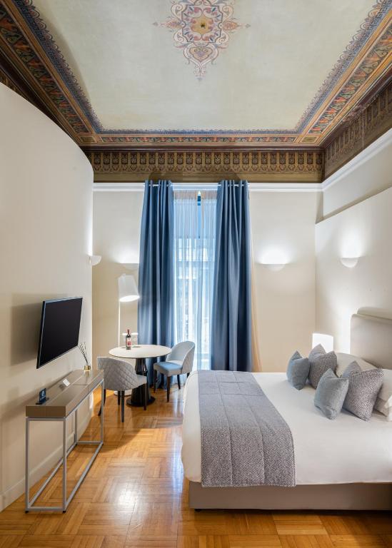 Posteľ alebo postele v izbe v ubytovaní 33SolonosSuites