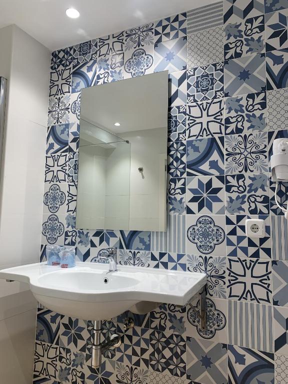 Vannituba majutusasutuses Hostal HPC Porto Colom