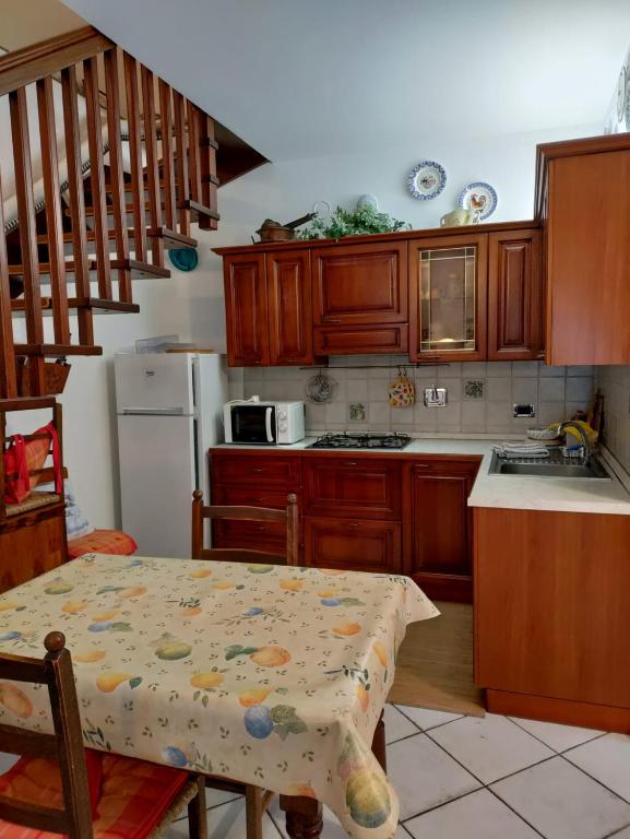 Kuchyňa alebo kuchynka v ubytovaní Casa Costanza