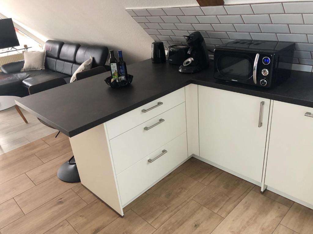 Kuchyň nebo kuchyňský kout v ubytování Appartement Sonnenschein