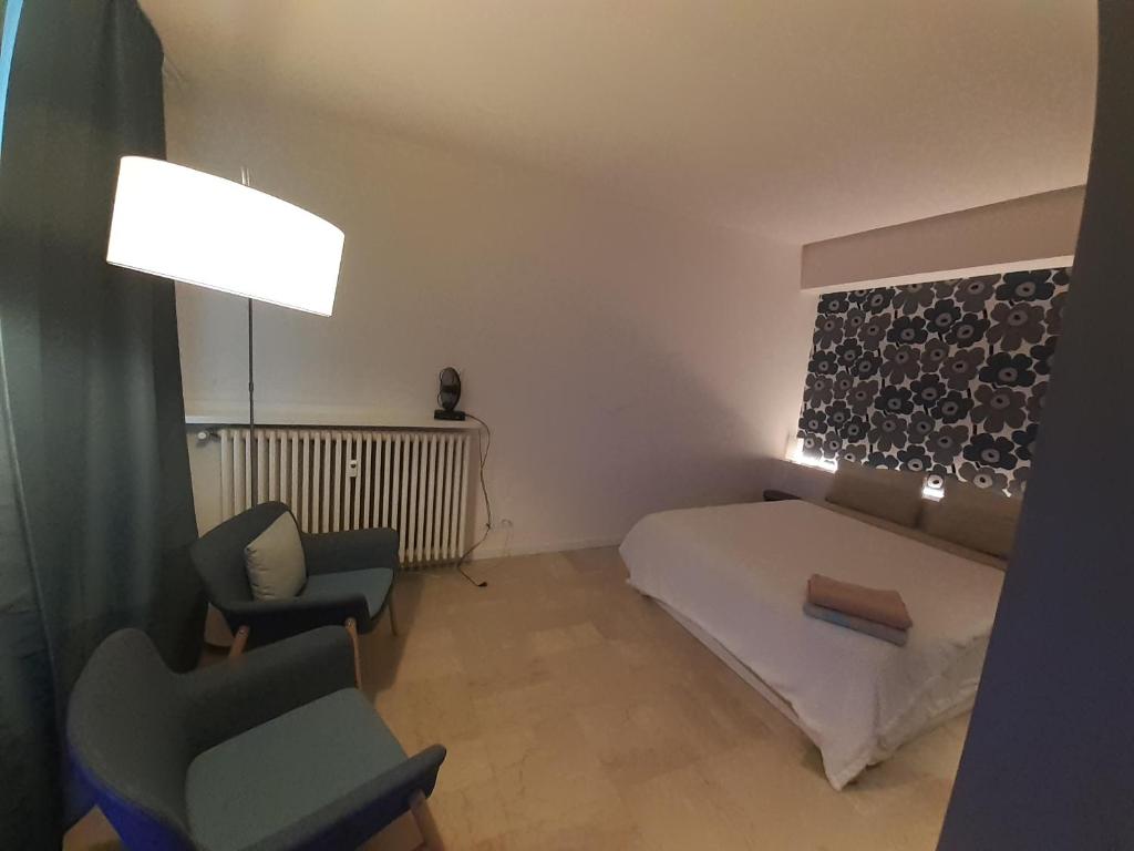 Posteľ alebo postele v izbe v ubytovaní Baretti House- Parcheggio Riservato per un soggiorno Perfetto