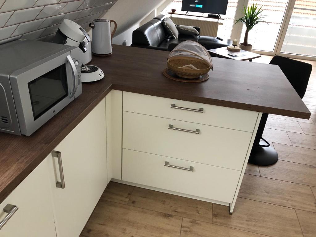 Kuchyň nebo kuchyňský kout v ubytování Appartement Bali