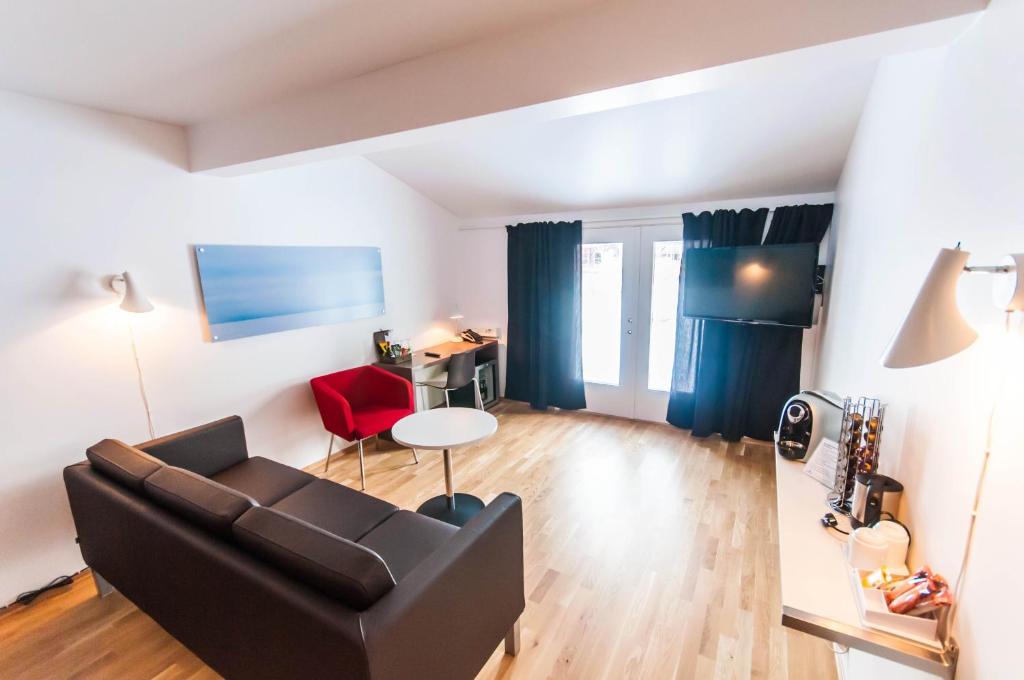 Posezení v ubytování Dolmsundet Hotell Hitra