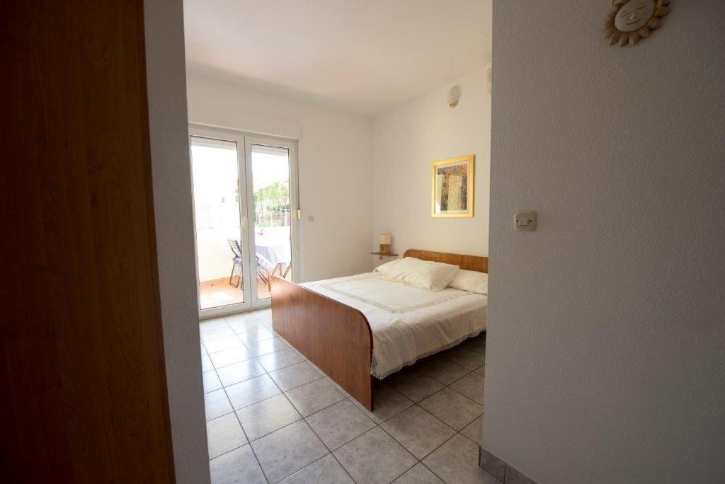 Posteľ alebo postele v izbe v ubytovaní Studio apartment in Duce with sea view, balcony, air conditioning, WiFi 132-8
