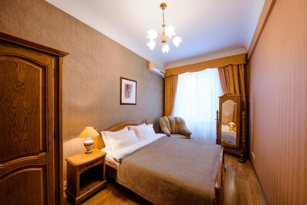 Postel nebo postele na pokoji v ubytování Boutique Apart-Hotel Sherborne