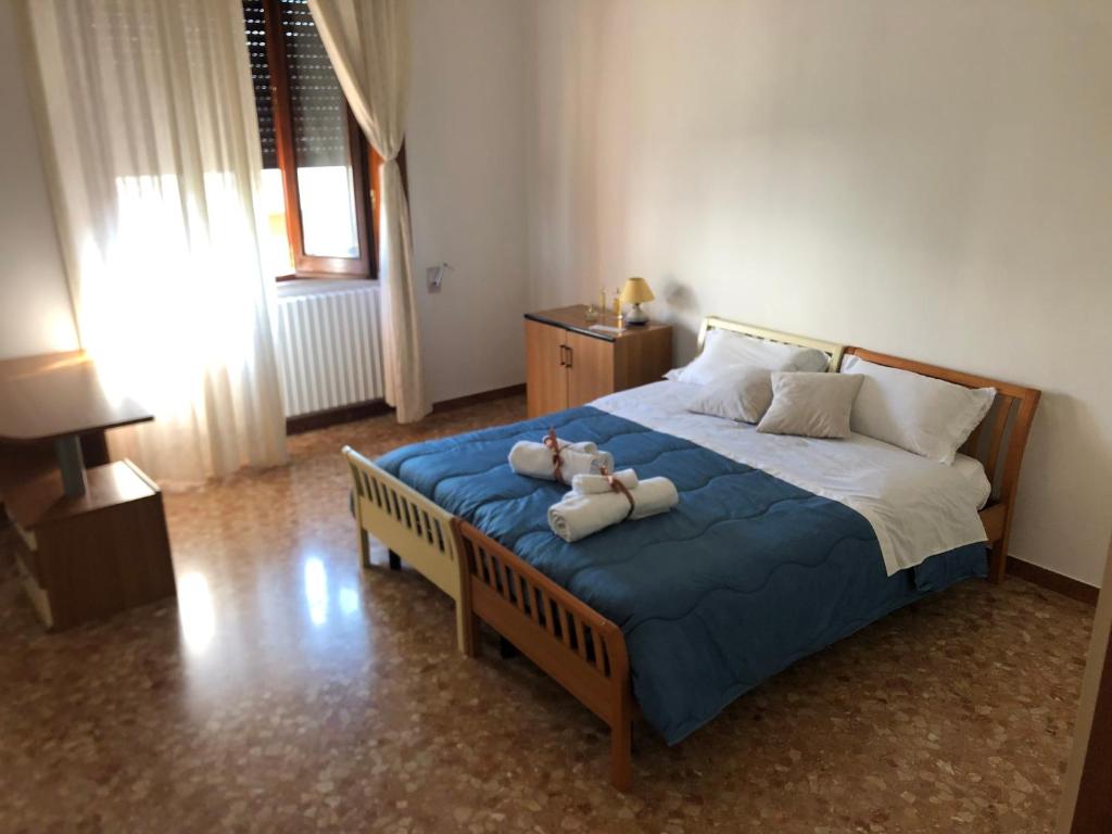 A bed or beds in a room at CasAnna nel cuore del Salento Arnesano LE