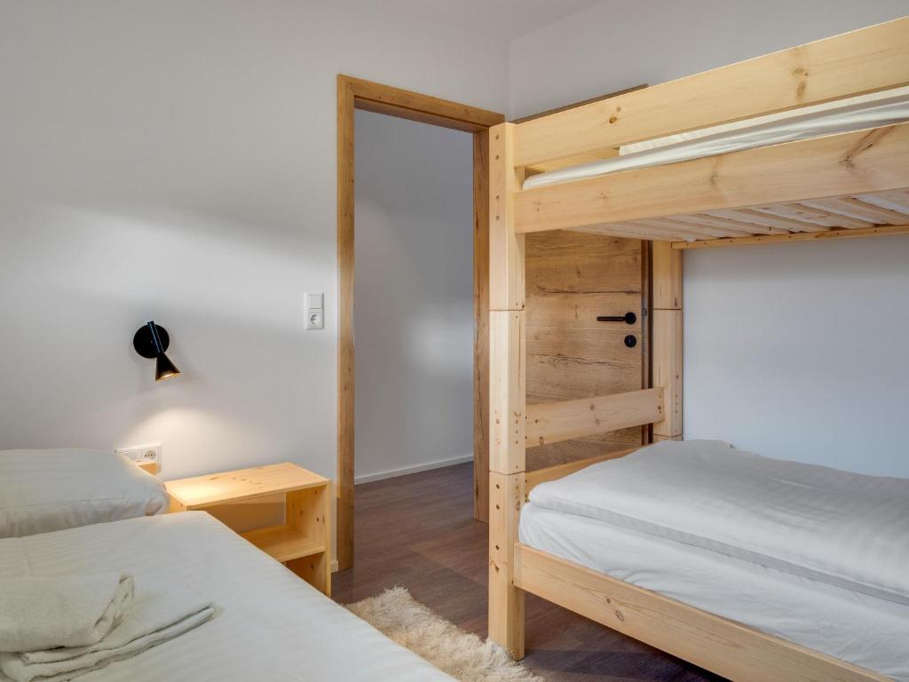 Postel nebo postele na pokoji v ubytování Natur Residenz Bad Häring