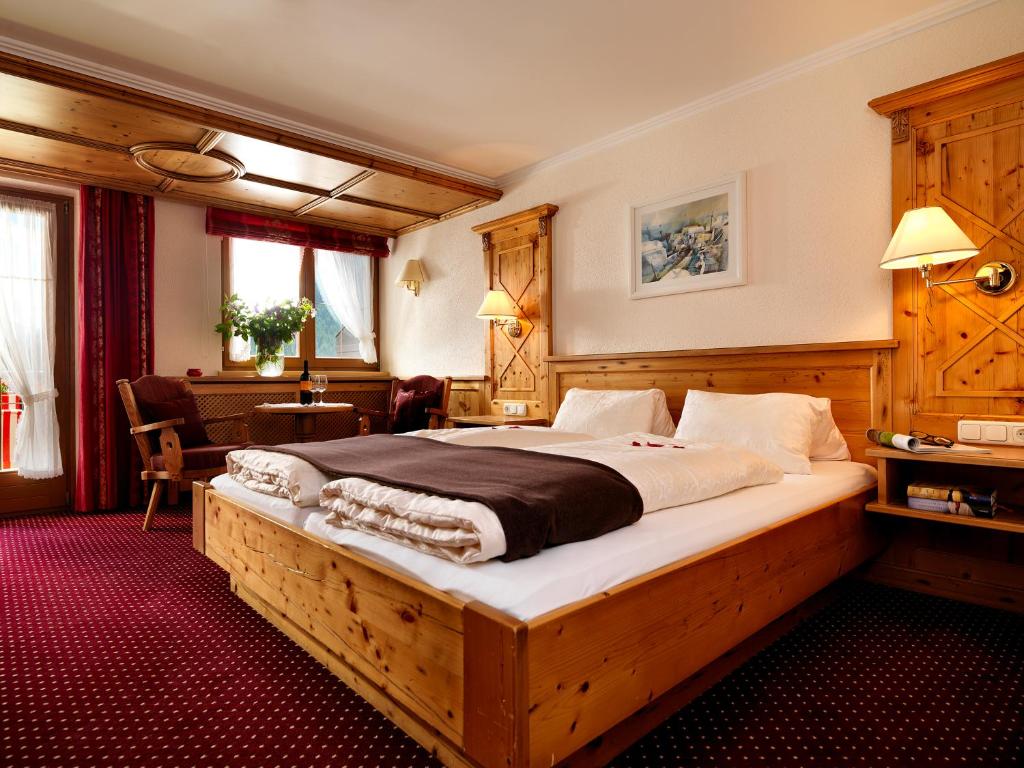 Postel nebo postele na pokoji v ubytování alpina&more APARTMENTS I ZIMMER