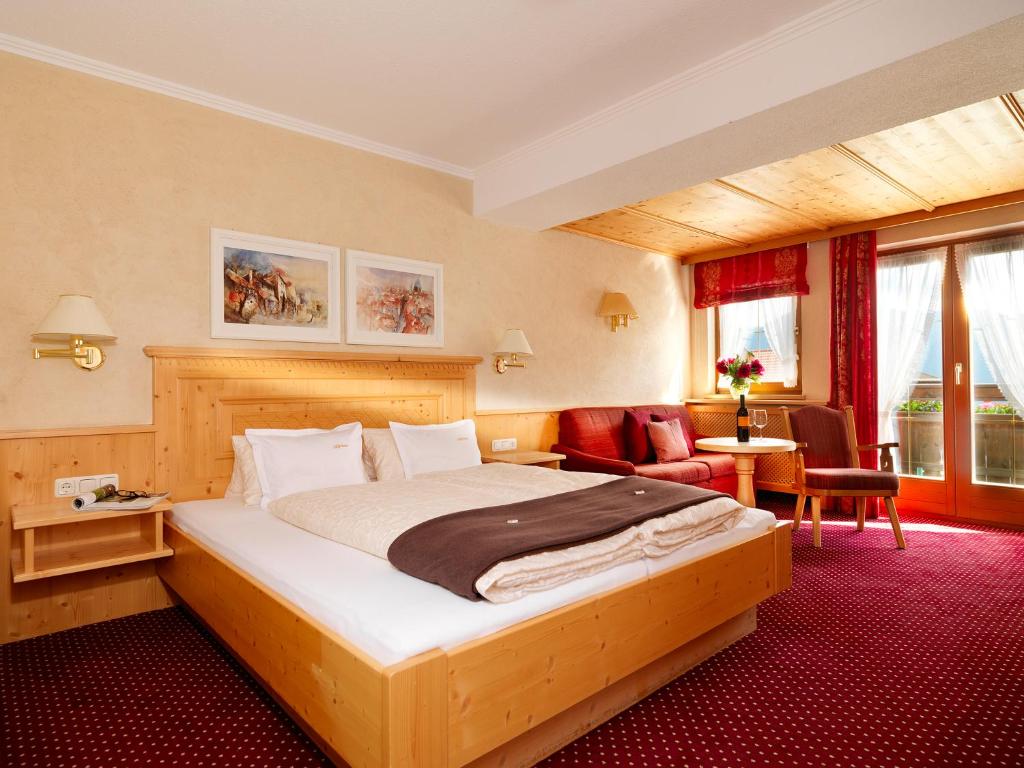 Postel nebo postele na pokoji v ubytování alpina&more APARTMENTS I ZIMMER