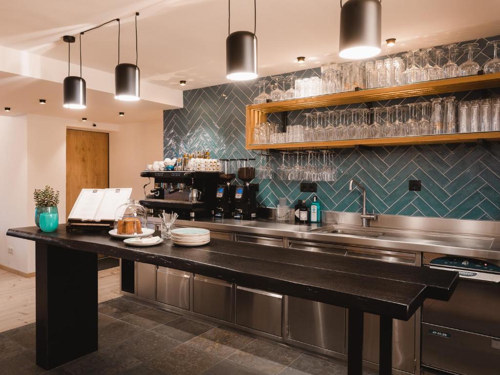 Kuchyň nebo kuchyňský kout v ubytování alpina&more APARTMENTS I ZIMMER