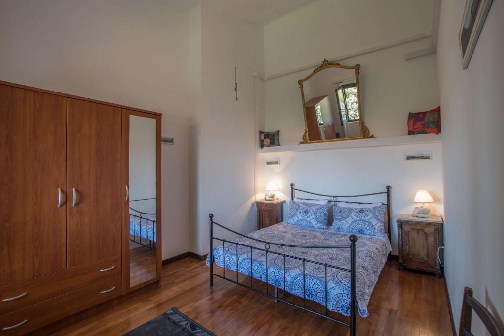 Łóżko lub łóżka w pokoju w obiekcie Apartmani Mirjana Umag