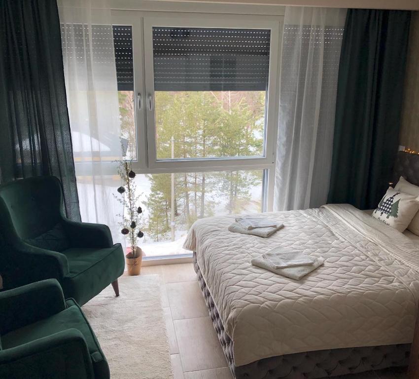 Una cama o camas en una habitación de Apartman Ambijent Divcibare