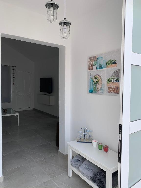 A television and/or entertainment centre at Casa Acqua